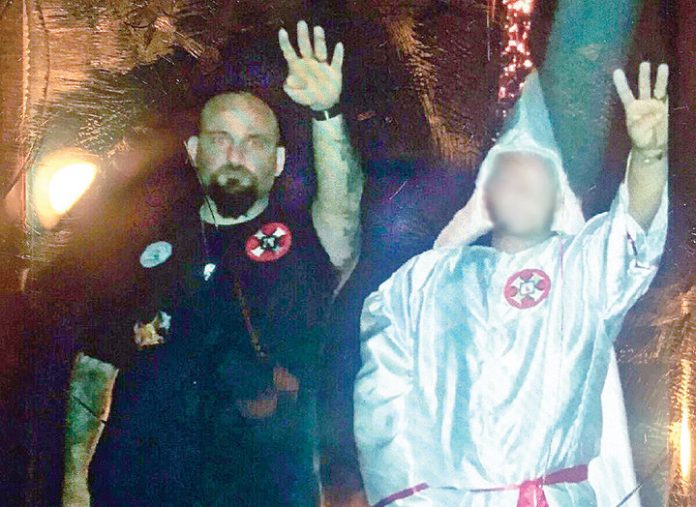 KKK Cop Fired After Nazi Salute Photo Surfaces