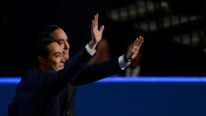 151249306-state-rep-joaquin-castro-waves-with-his-brother-san