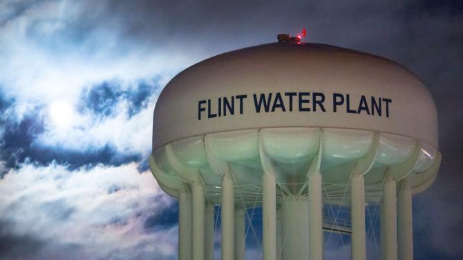 506499186-the-city-of-flint-water-plant-is-illuminated-by