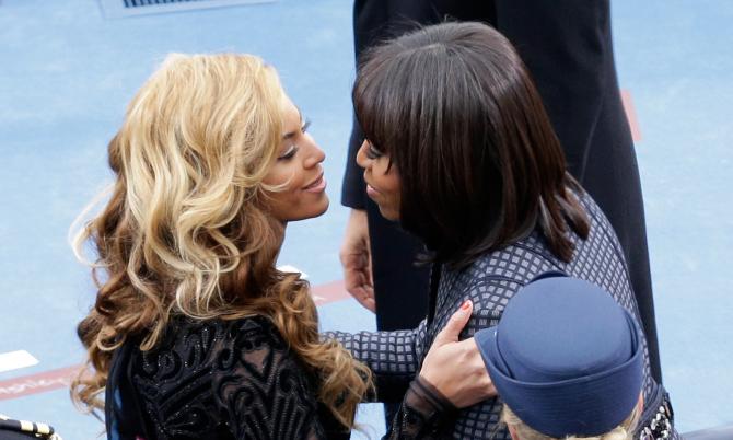 159834816-first-lady-michelle-obama-greets-singer-beyonce-after