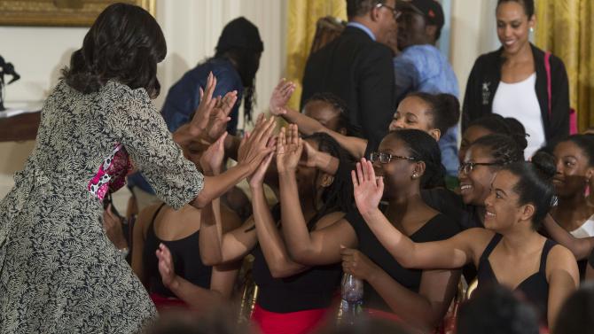 509078382-first-lady-michelle-obama-greets-students-a-day-long
