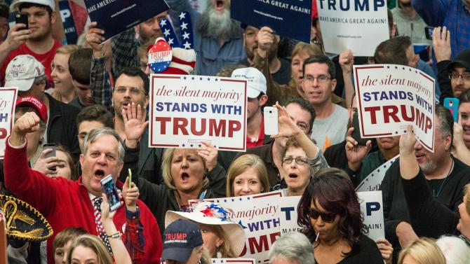 514192812-donald-trump-supporters-cheer-on-the-republican