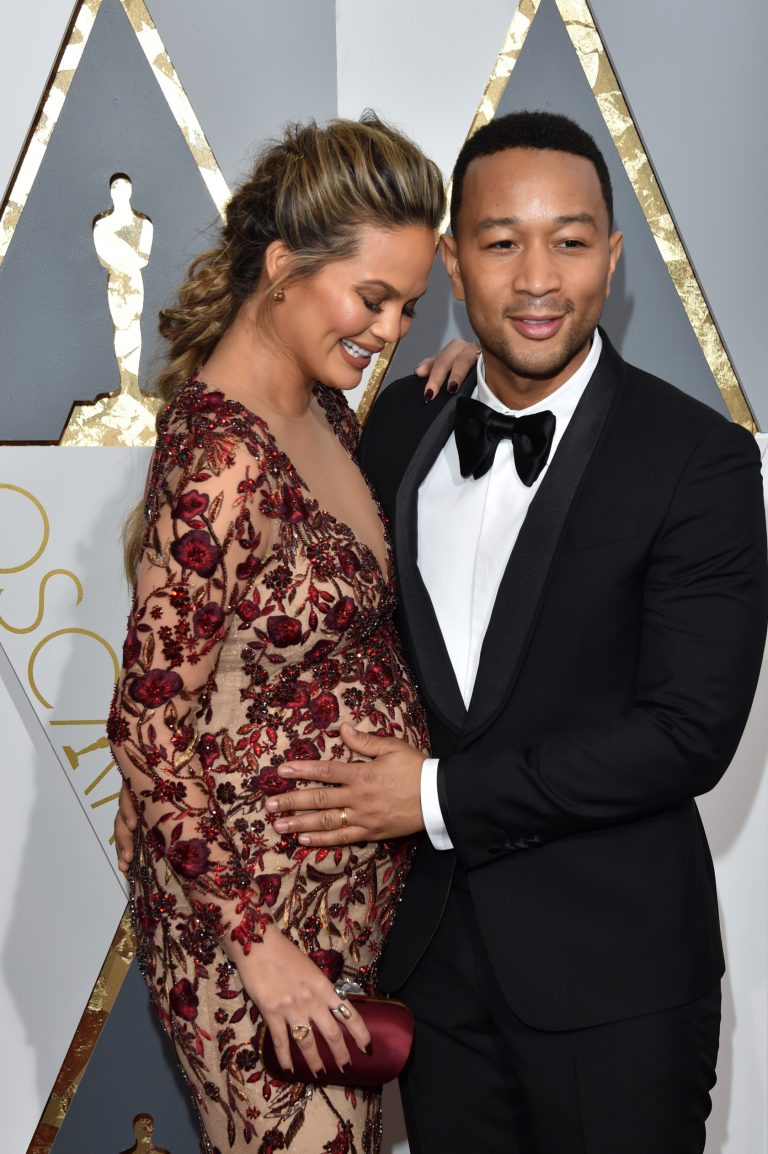AM BUZZ: First Adorable Picture Of Chrissy Teigen And John Legend’s Baby; Dame Dash Feels He Could’ve Saved Aaliyah & More…