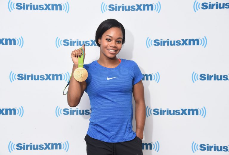 AM BUZZ: Gabby Douglas Defends Miss America Swim Competition; Halle Berry Covers W & More…