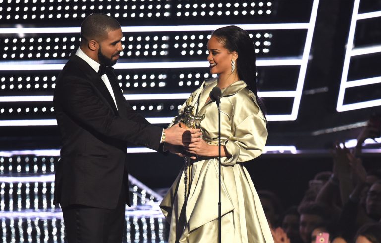 AM BUZZ: Rihanna Finally Kisses Drake; Solange New Face Of Michael Kors & More…
